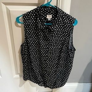 Sleeveless cropped polka dot button down blouse with tie bottom